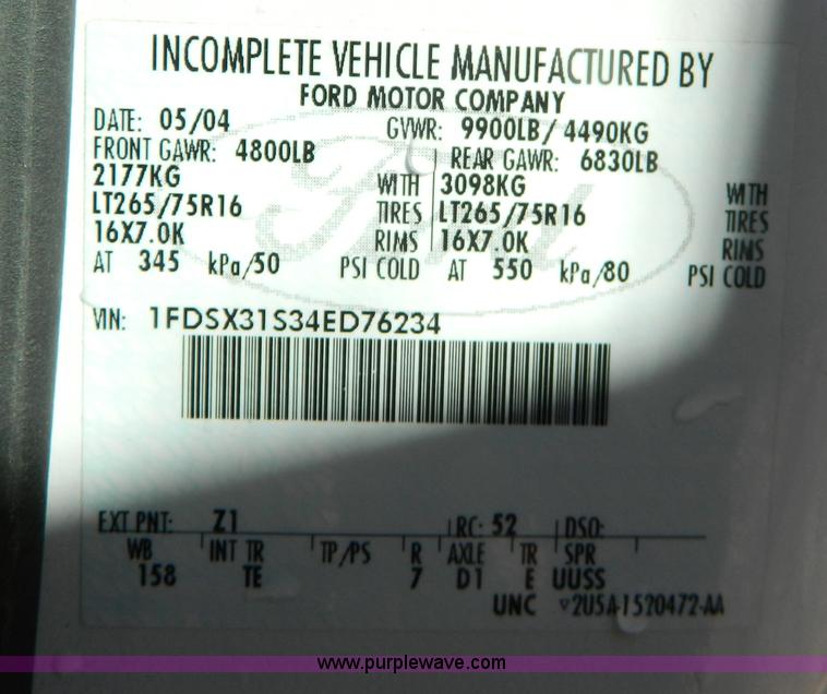 image for item G7537 2004 Ford F350 XL Super Duty flatbed pickup truck