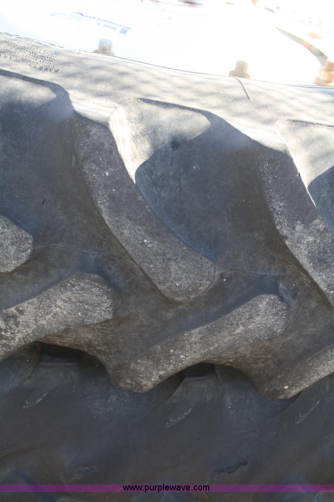 image for item V9500 (4) Firestone 320/90R50 tires and wheels