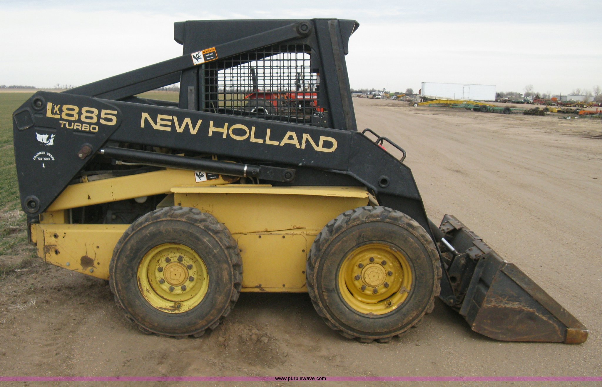 1997 New Holland LX885 Turbo skid steer in Maize, KS Item E3025 sold