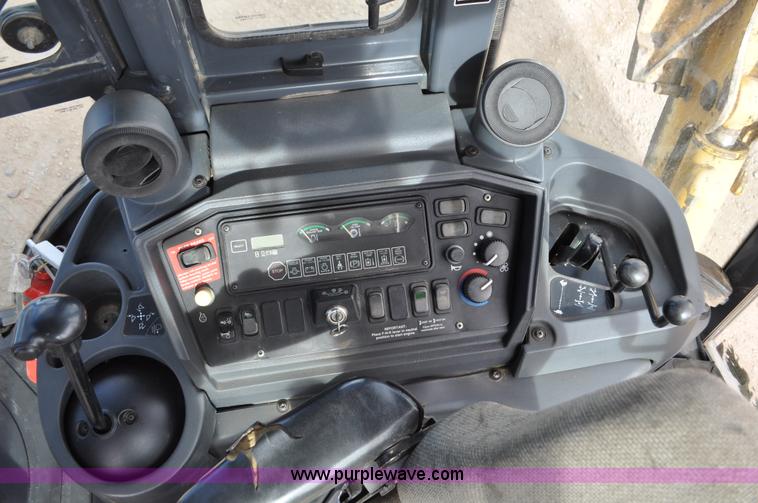 image for item C3313 2002 John Deere 410G backhoe extendahoe