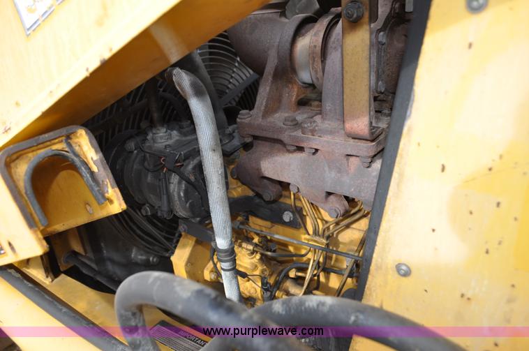image for item C3313 2002 John Deere 410G backhoe extendahoe