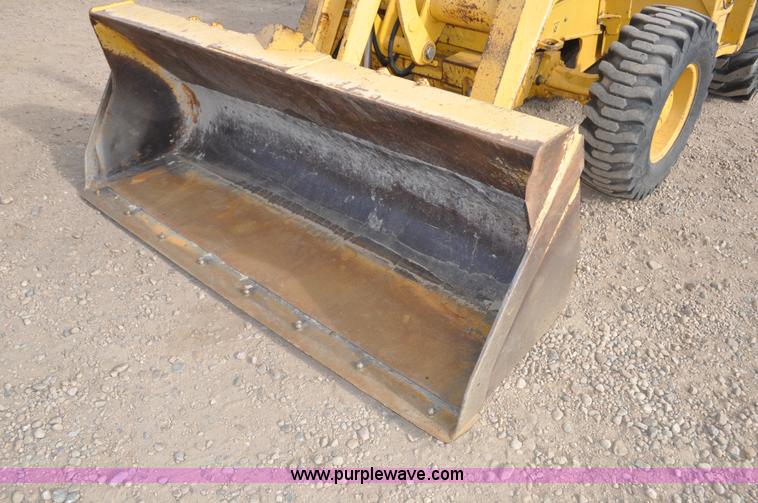 image for item C3313 2002 John Deere 410G backhoe extendahoe