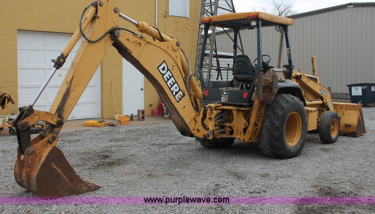 image for item E3038 1997 John Deere 310E backhoe