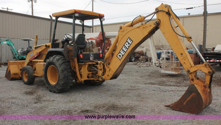 image for item E3038 1997 John Deere 310E backhoe