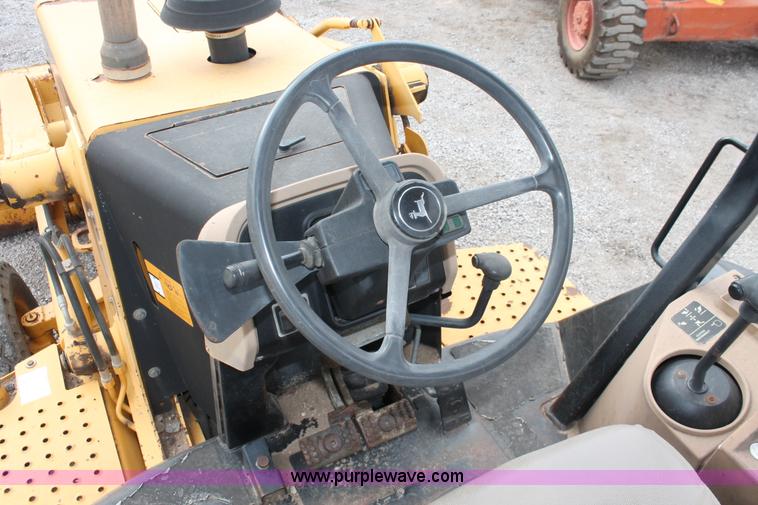 image for item E3038 1997 John Deere 310E backhoe