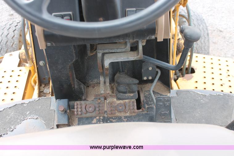 image for item E3038 1997 John Deere 310E backhoe