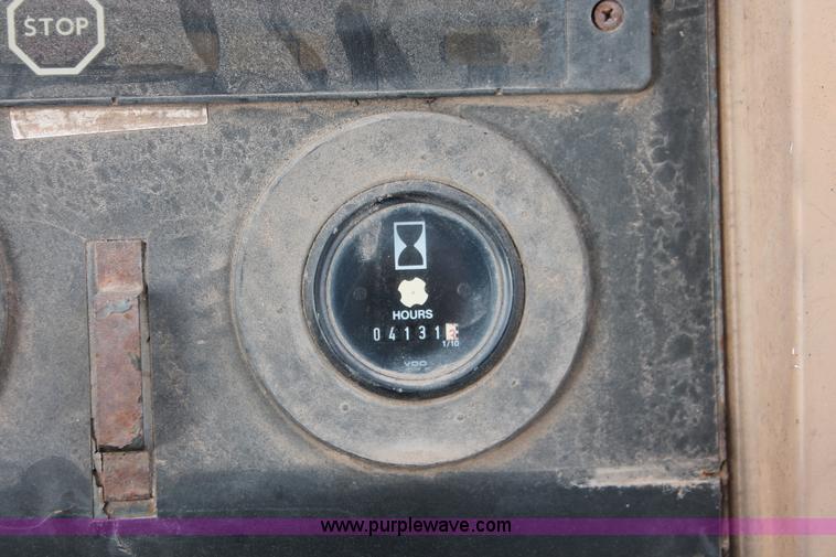 image for item E3038 1997 John Deere 310E backhoe