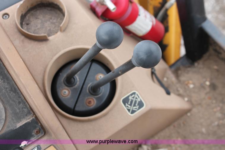 image for item E3038 1997 John Deere 310E backhoe