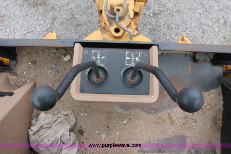 image for item E3038 1997 John Deere 310E backhoe