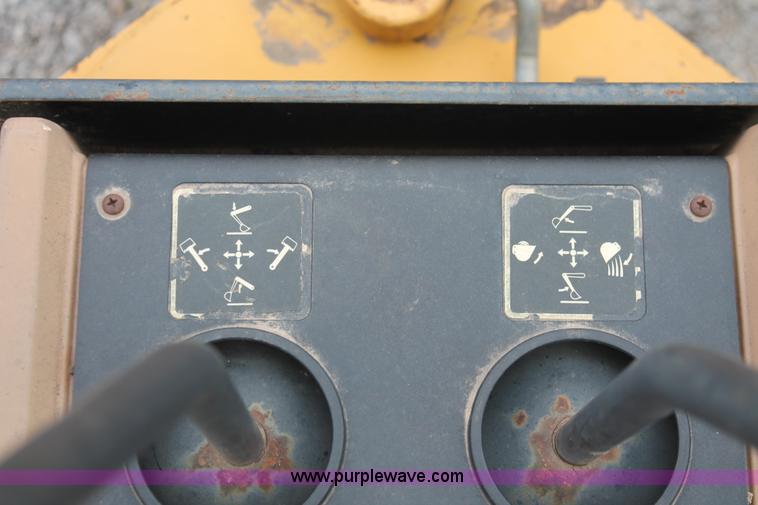 image for item E3038 1997 John Deere 310E backhoe