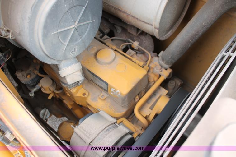 image for item E3038 1997 John Deere 310E backhoe