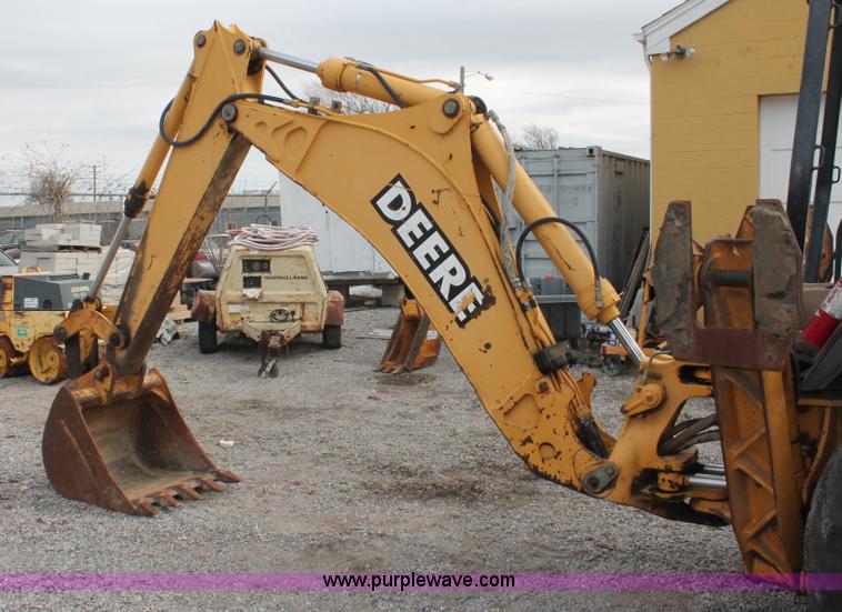 image for item E3038 1997 John Deere 310E backhoe