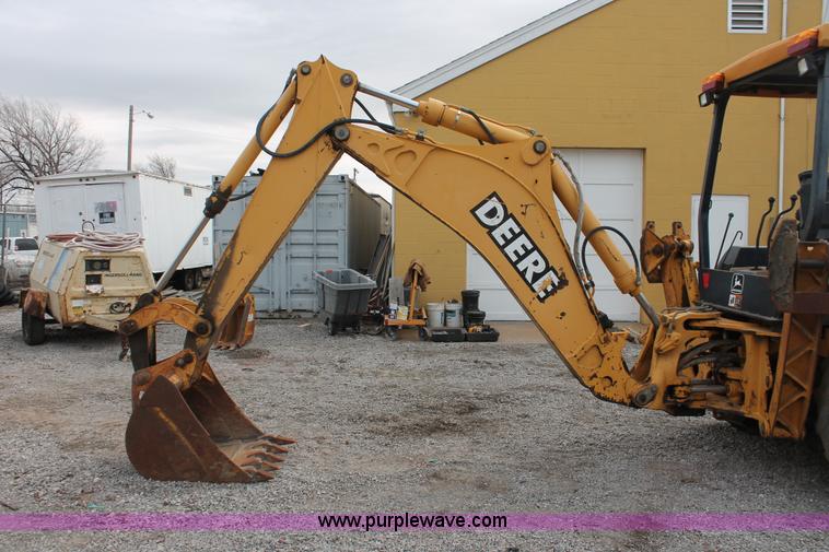image for item E3038 1997 John Deere 310E backhoe