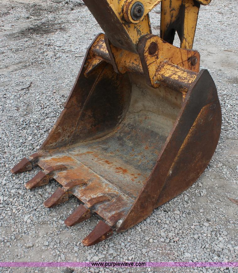 image for item E3038 1997 John Deere 310E backhoe