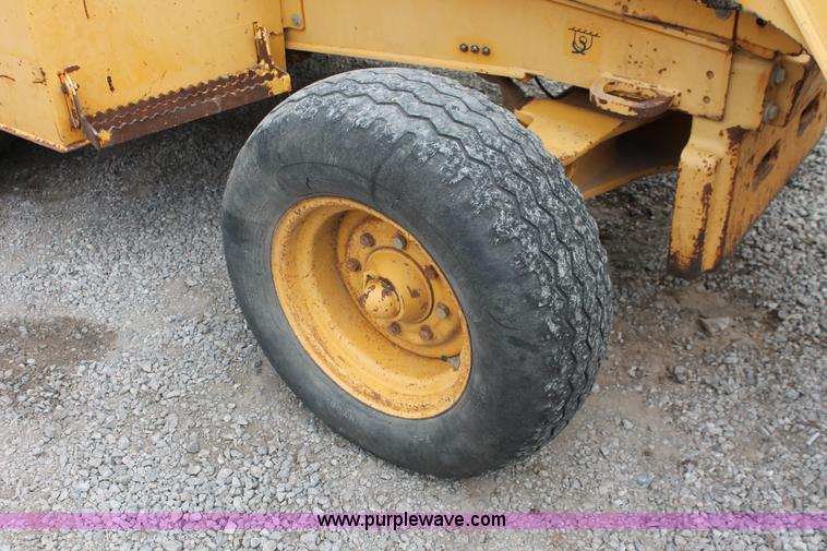 image for item E3038 1997 John Deere 310E backhoe