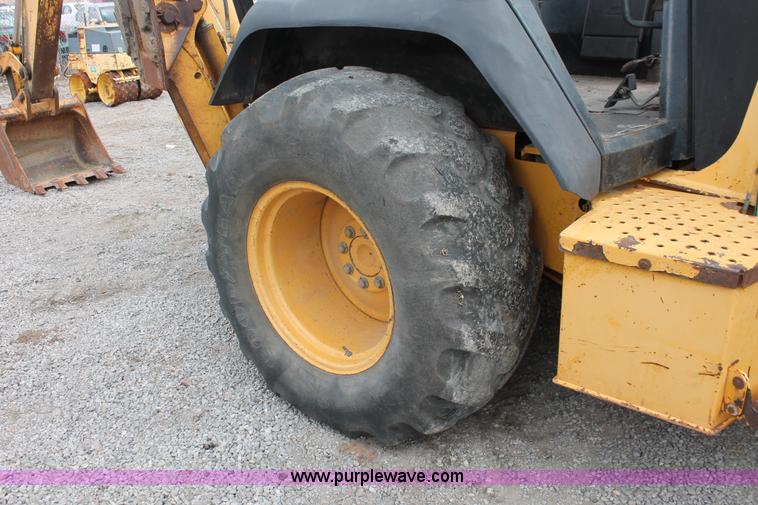 image for item E3038 1997 John Deere 310E backhoe