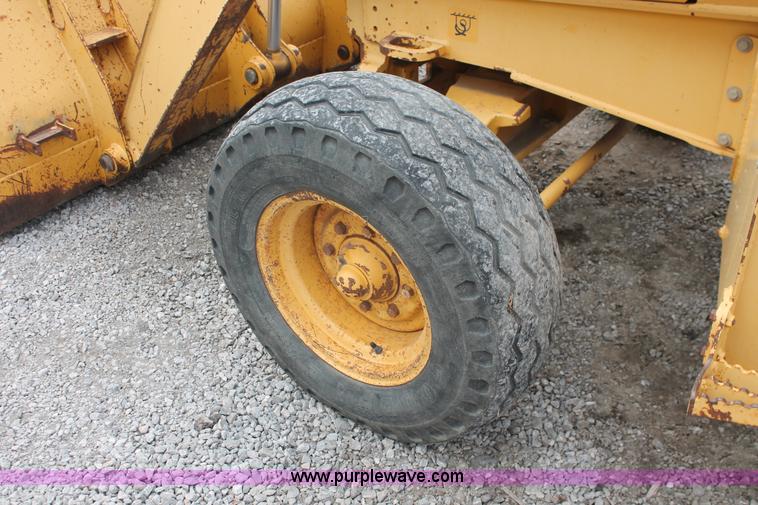 image for item E3038 1997 John Deere 310E backhoe