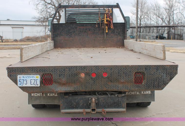 image for item E3056 2005 Chevrolet C4500 flat dump bed truck