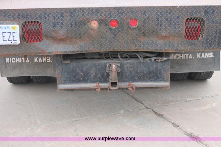 image for item E3056 2005 Chevrolet C4500 flat dump bed truck