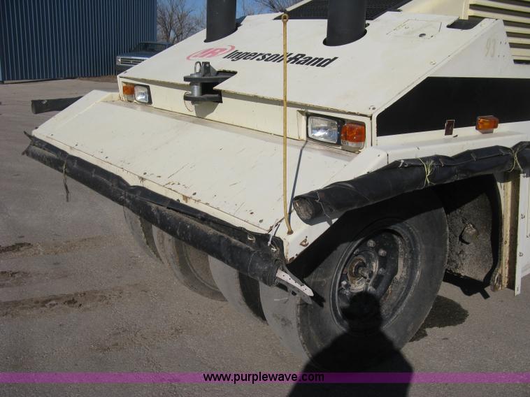 image for item E3068 2002 Ingersoll Rand PT-240R rubber tire asphalt roller