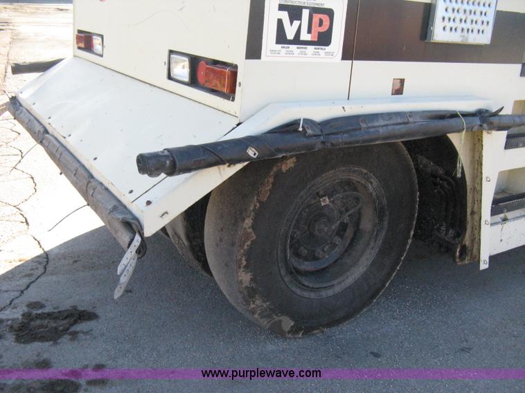 image for item E3068 2002 Ingersoll Rand PT-240R rubber tire asphalt roller