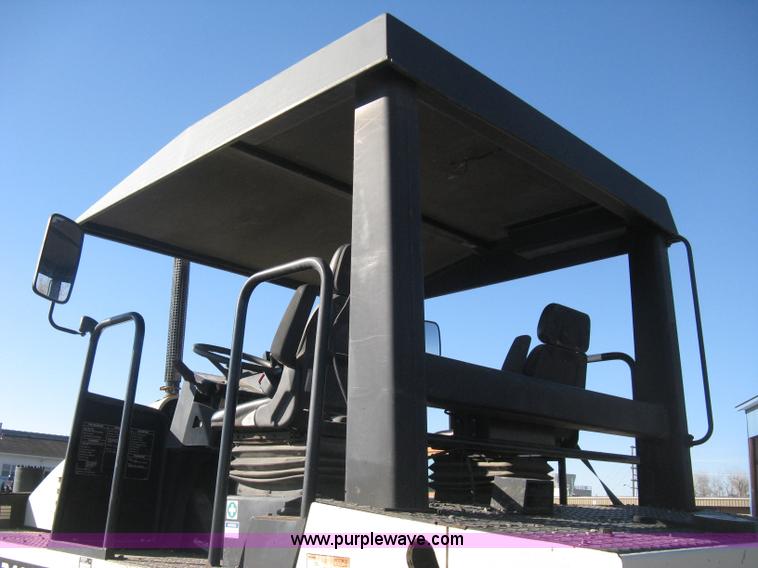 image for item E3068 2002 Ingersoll Rand PT-240R rubber tire asphalt roller