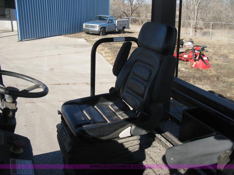 image for item E3068 2002 Ingersoll Rand PT-240R rubber tire asphalt roller