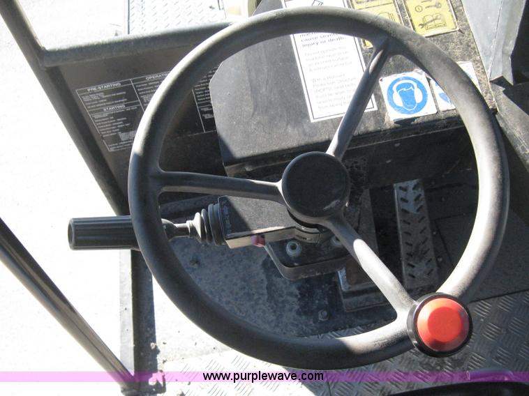 image for item E3068 2002 Ingersoll Rand PT-240R rubber tire asphalt roller