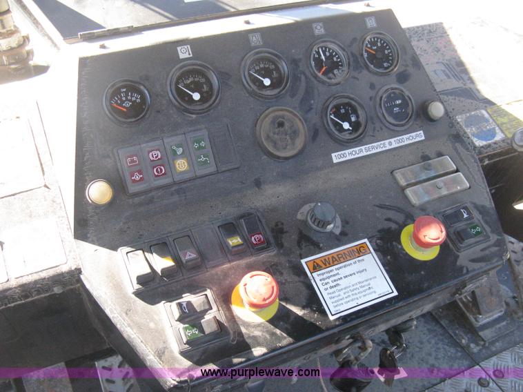 image for item E3068 2002 Ingersoll Rand PT-240R rubber tire asphalt roller