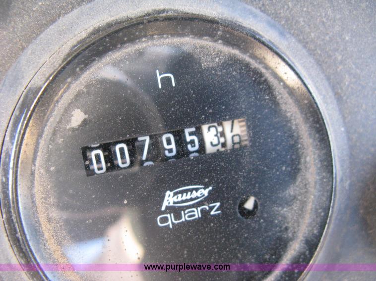 image for item E3068 2002 Ingersoll Rand PT-240R rubber tire asphalt roller