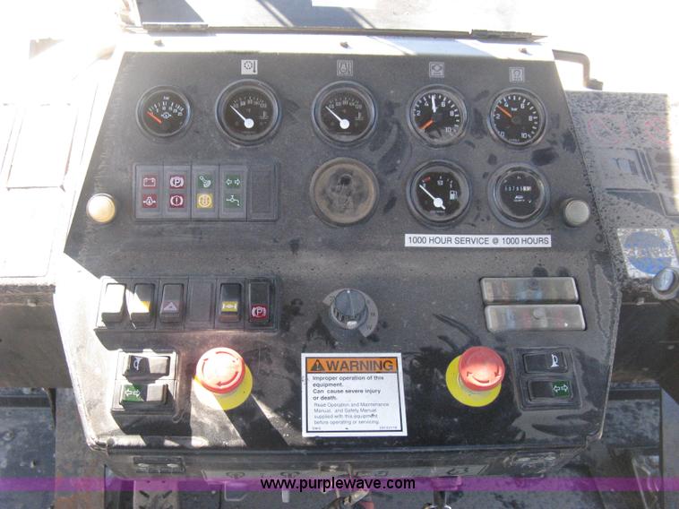 image for item E3068 2002 Ingersoll Rand PT-240R rubber tire asphalt roller