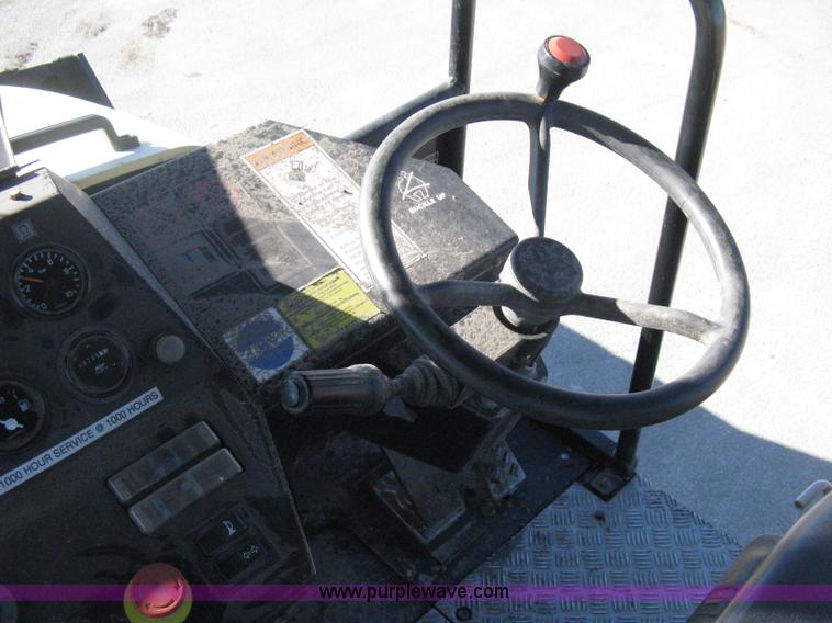 image for item E3068 2002 Ingersoll Rand PT-240R rubber tire asphalt roller