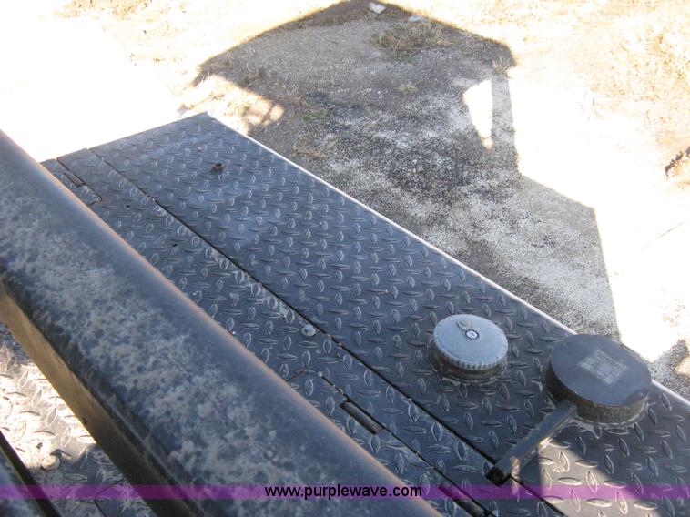 image for item E3068 2002 Ingersoll Rand PT-240R rubber tire asphalt roller