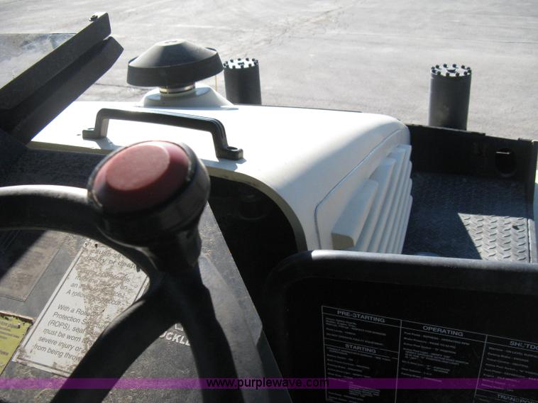 image for item E3068 2002 Ingersoll Rand PT-240R rubber tire asphalt roller