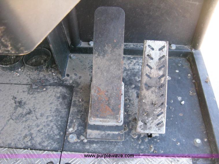 image for item E3068 2002 Ingersoll Rand PT-240R rubber tire asphalt roller