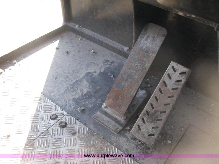 image for item E3068 2002 Ingersoll Rand PT-240R rubber tire asphalt roller