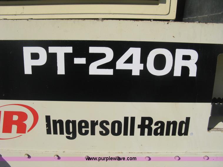 image for item E3068 2002 Ingersoll Rand PT-240R rubber tire asphalt roller