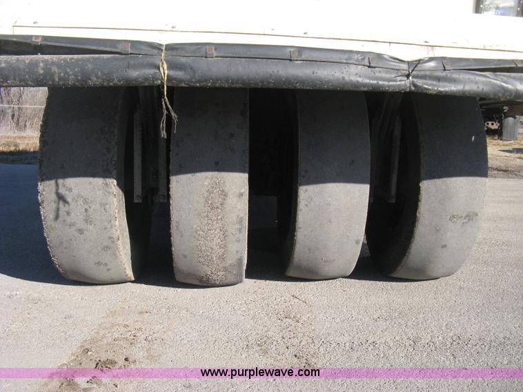 image for item E3068 2002 Ingersoll Rand PT-240R rubber tire asphalt roller