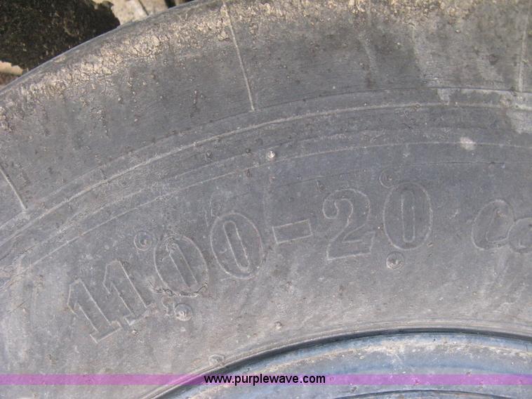 image for item E3068 2002 Ingersoll Rand PT-240R rubber tire asphalt roller