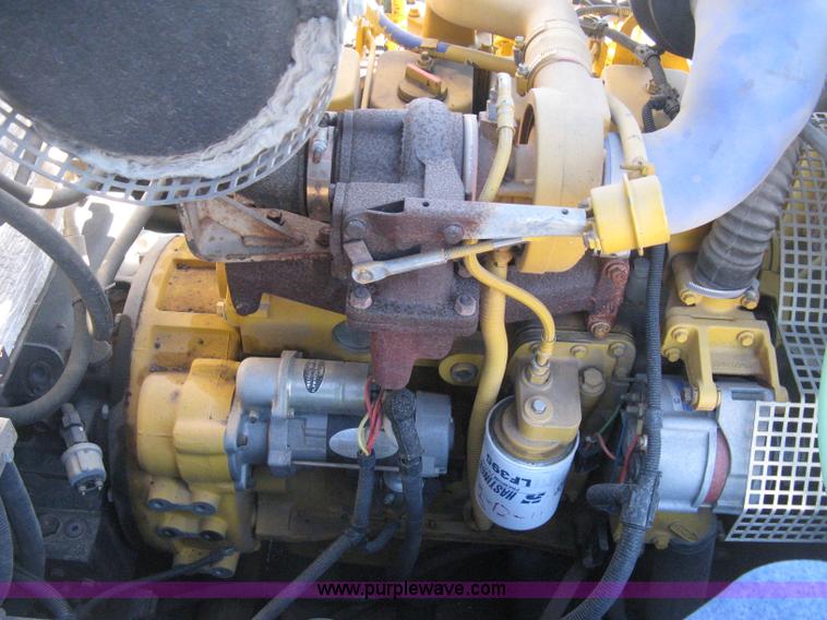 image for item E3068 2002 Ingersoll Rand PT-240R rubber tire asphalt roller