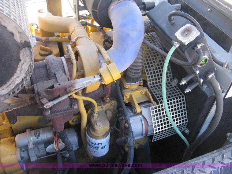 image for item E3068 2002 Ingersoll Rand PT-240R rubber tire asphalt roller