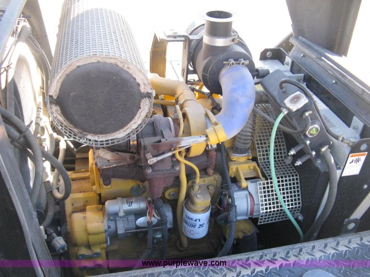 image for item E3068 2002 Ingersoll Rand PT-240R rubber tire asphalt roller