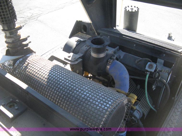 image for item E3068 2002 Ingersoll Rand PT-240R rubber tire asphalt roller