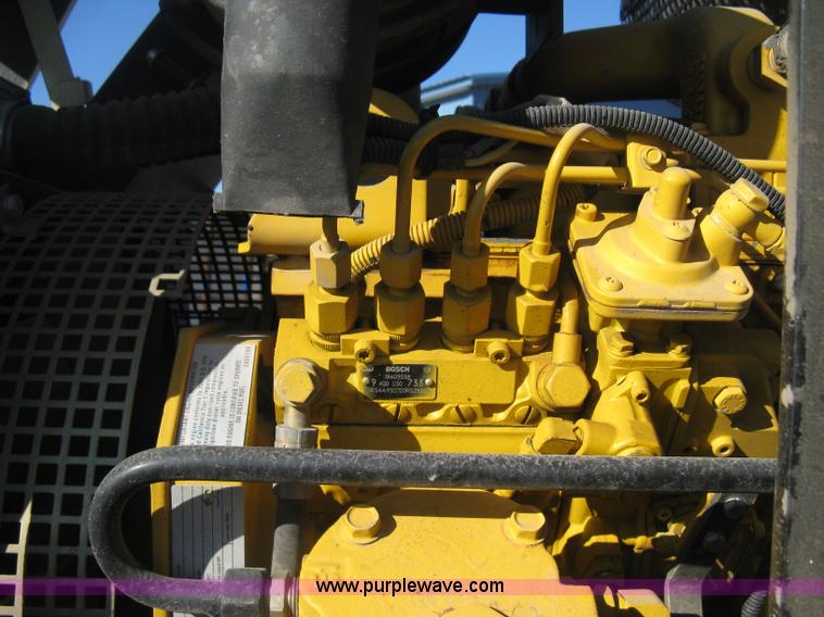 image for item E3068 2002 Ingersoll Rand PT-240R rubber tire asphalt roller