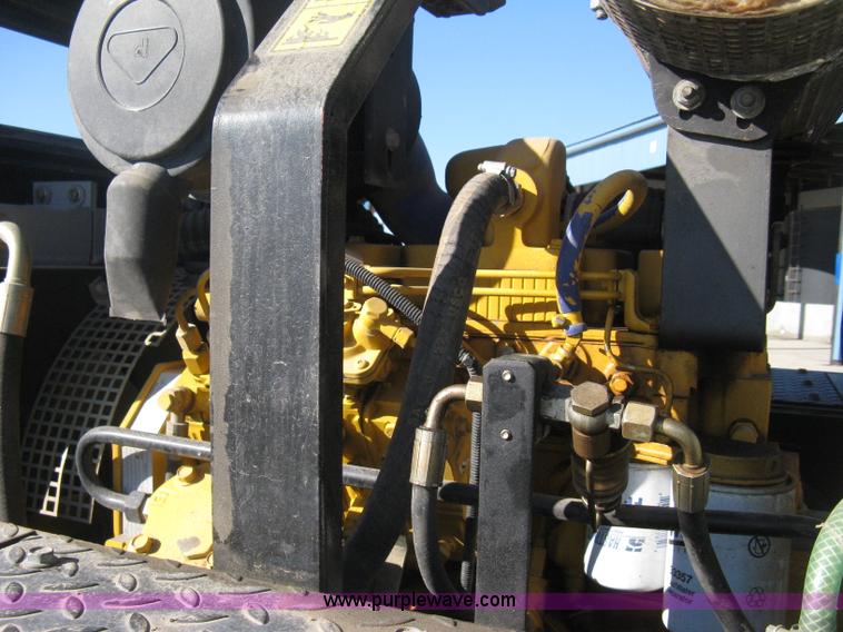 image for item E3068 2002 Ingersoll Rand PT-240R rubber tire asphalt roller