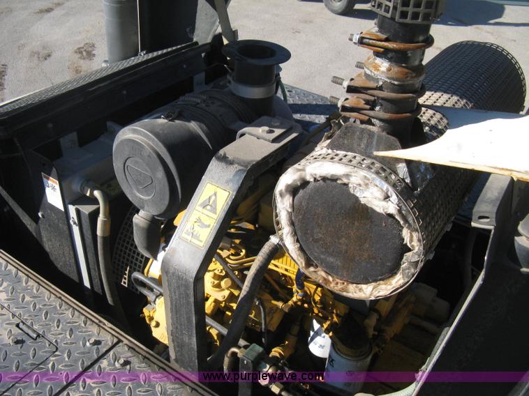 image for item E3068 2002 Ingersoll Rand PT-240R rubber tire asphalt roller