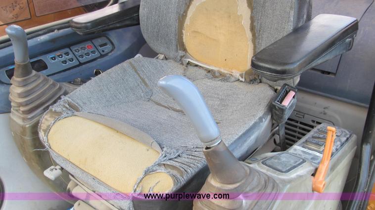 image for item E3722 2001 Case CX160 excavator