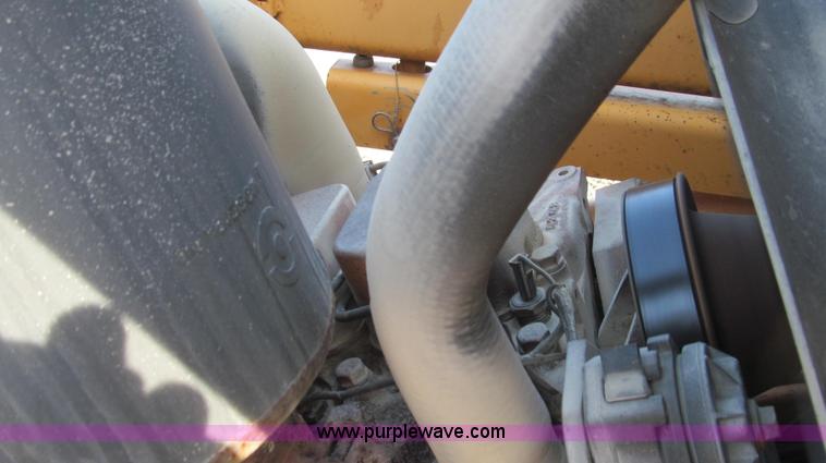 image for item E3723 1992 Case 580 Super K Extendahoe backhoe