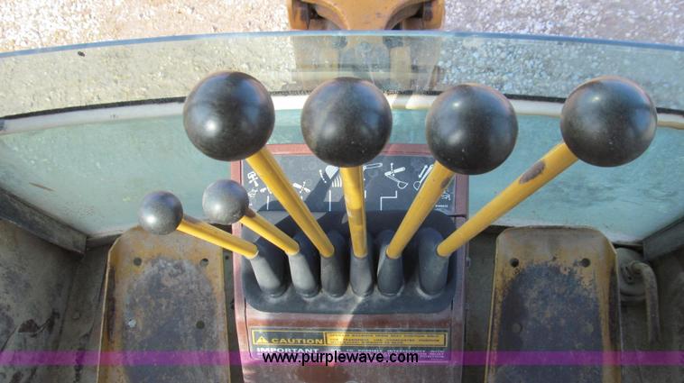 image for item E3723 1992 Case 580 Super K Extendahoe backhoe