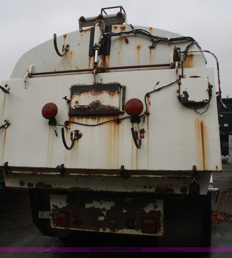 image for item F2511 1993 Ford Cargo 700 Elgin street sweeper